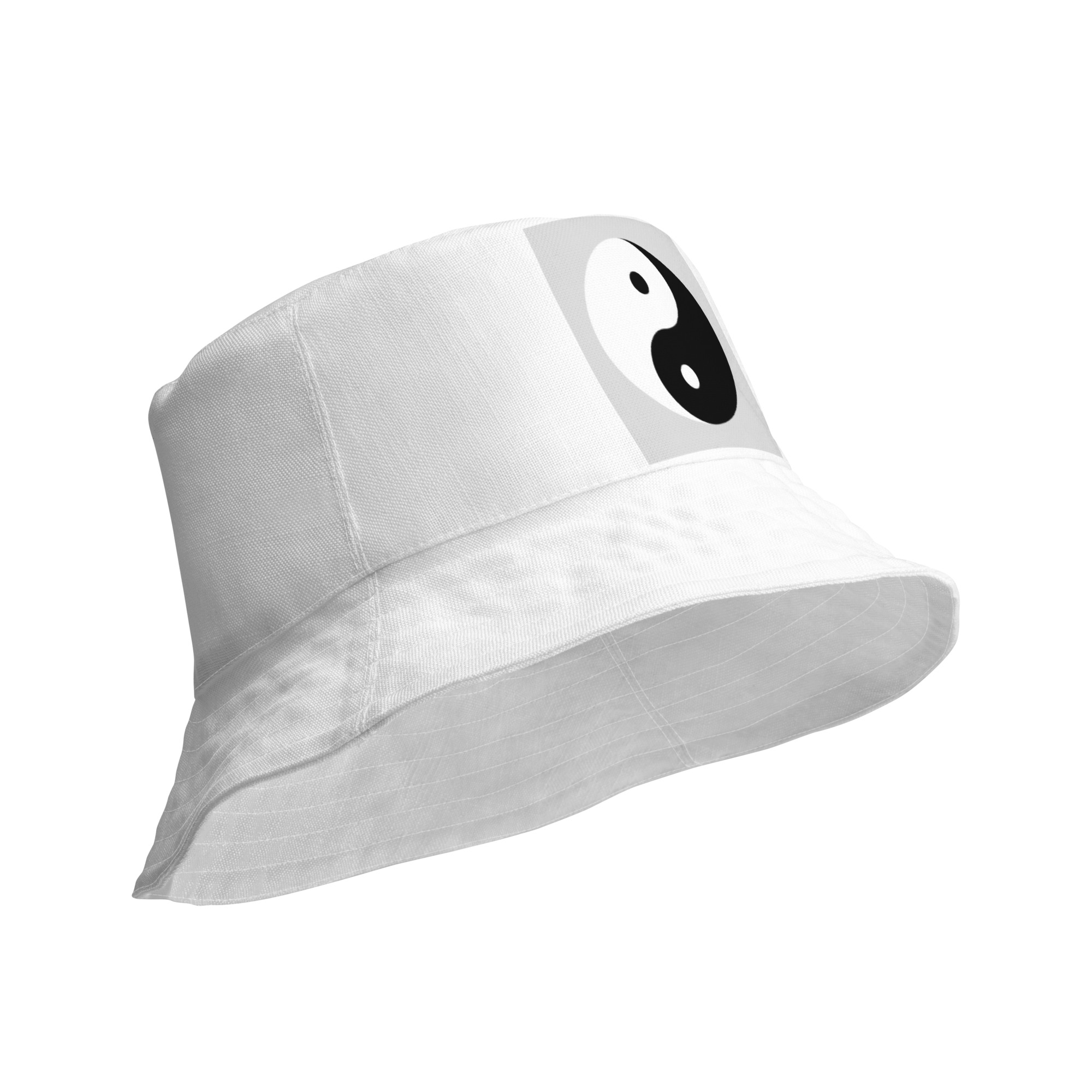 all-over-print-reversible-bucket-hat-white-product-details-outside-6403fe2e1dd86.jpg Reversible bucket hat - Image 1